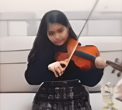 Miss Ania, violin student